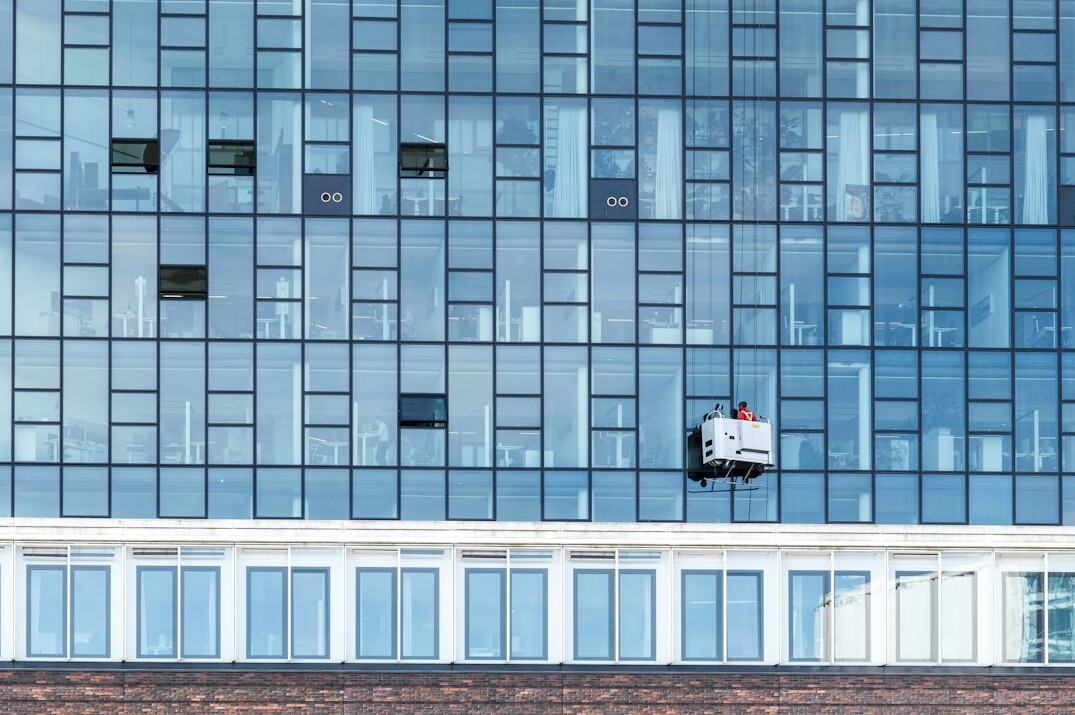 Modern glass office building exterior in a German city
